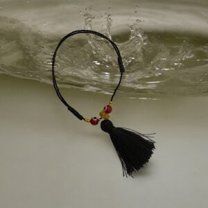 Bracciale in filo di seta con Ambra e occhio turco